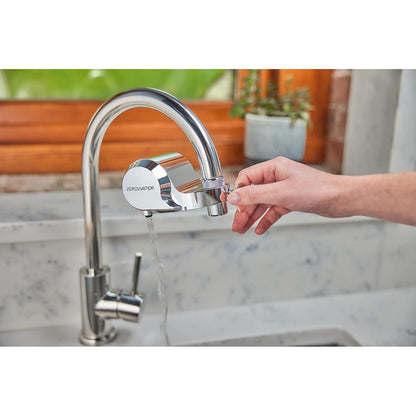 ZeroWater ExtremeLife faucet mount filter attached to kitchen faucet, demonstrating clean, filtered water flow.