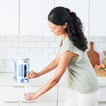 ZeroWater 12-cup water filter pitcher with clear body and blue lid, designed for clean, filtered drinking water.