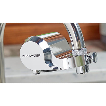 ZeroWater ExtremeLife faucet mount filter attached to kitchen faucet, clear water stream, showcasing filtration system and easy installation.